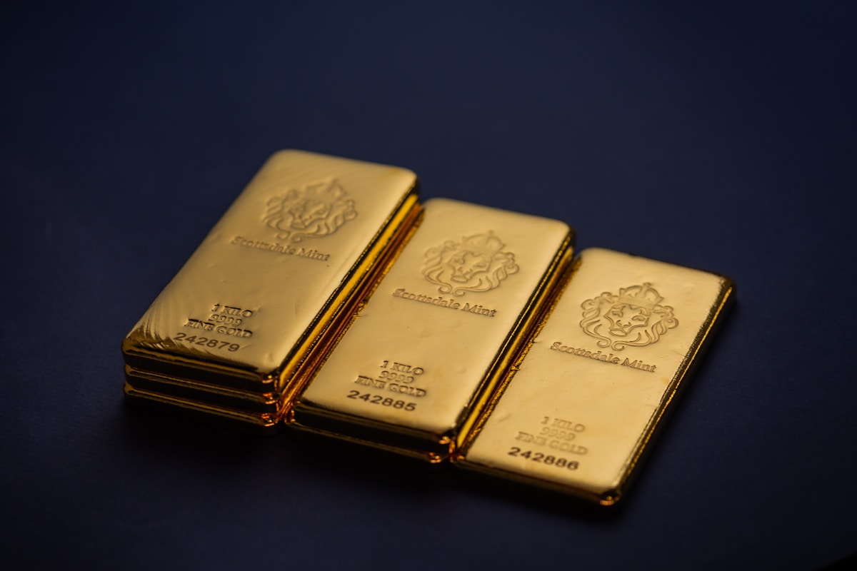 Gold bullion bars stacked on top of each other
